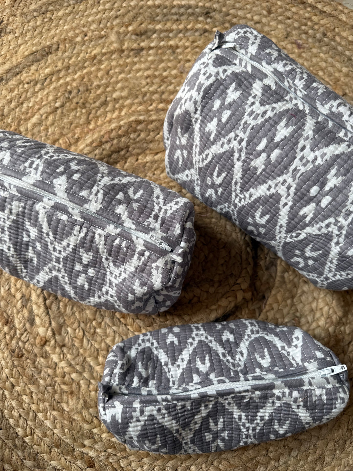 Grey cris cross Makeup/cosmetics/toiletry pouches
